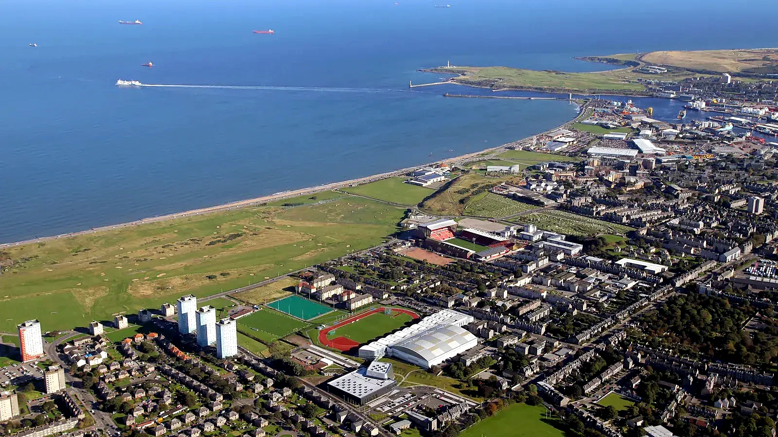 Aerial view of Aberdeen Sports Village and the coast